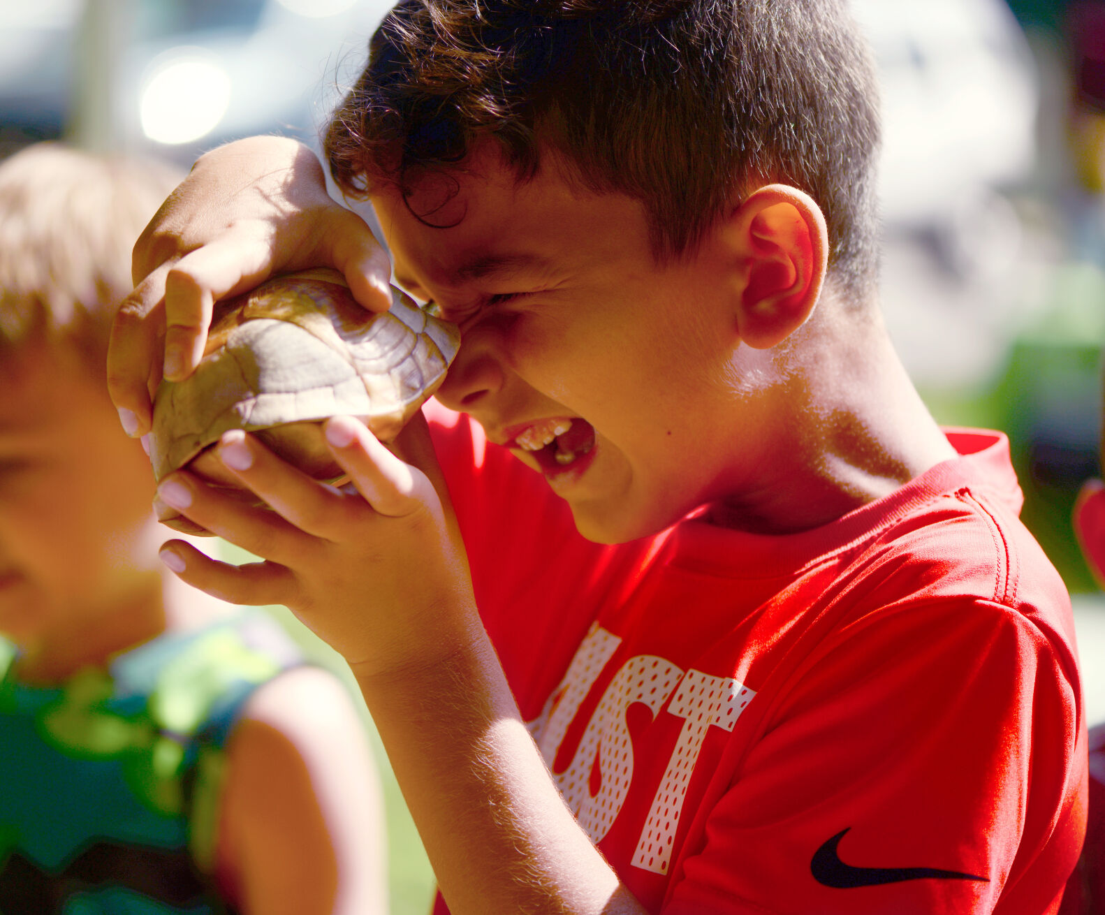 Gatlin Lucas looks inside a turtle shell